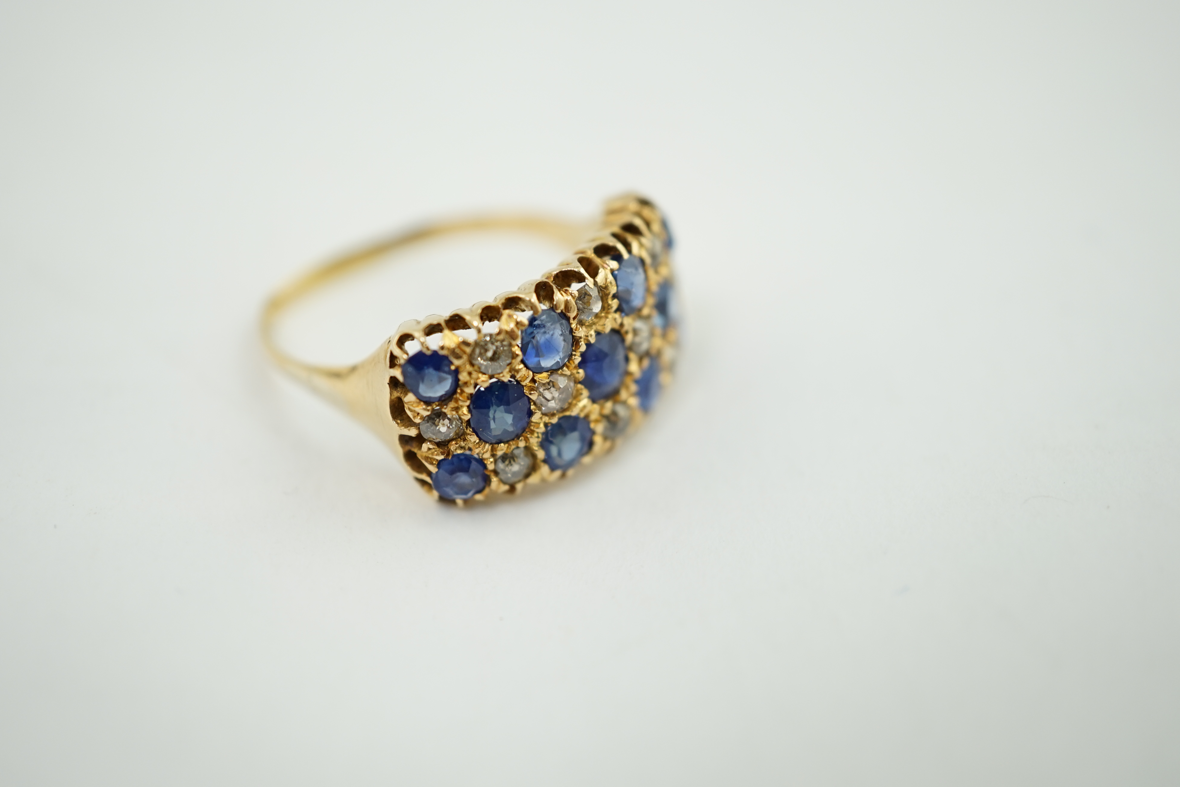 A late Victorian gold, sapphire and diamond rectangular cluster ring